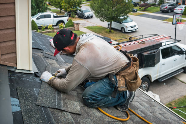 Professional Roofing technician working in Hankamer, TX